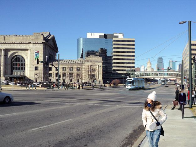 Streetcar operating southbound on Main Street near Union Station, just before turning east onto Pershing Road.